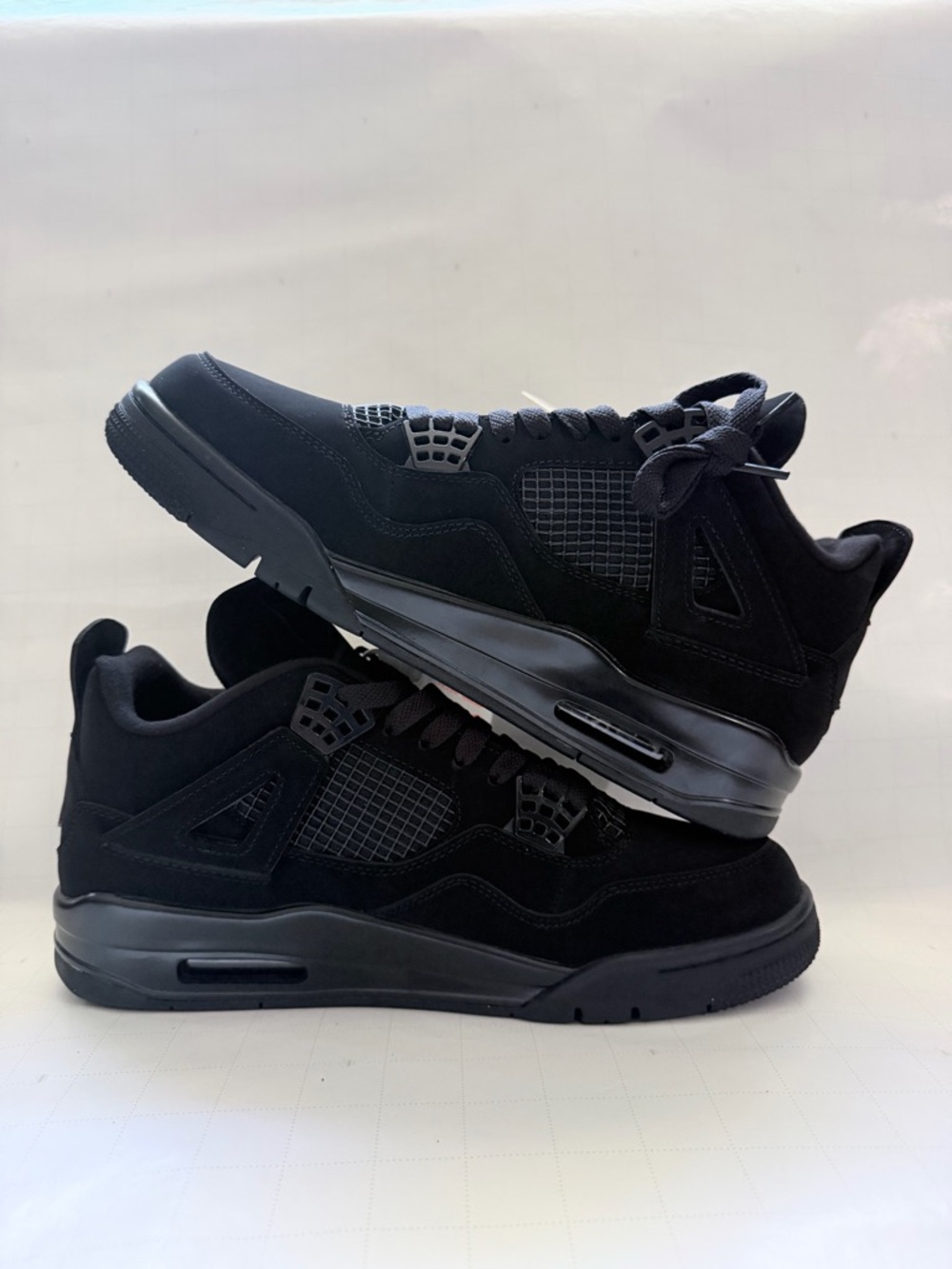 Jordan Men's All-Black Retro 4 Sneakers